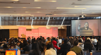 #CanadaWeWant conference attendees facing towards conference speaker