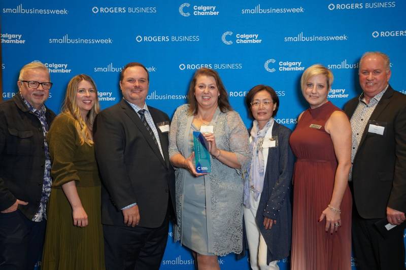 A group of people posing for a photo. 