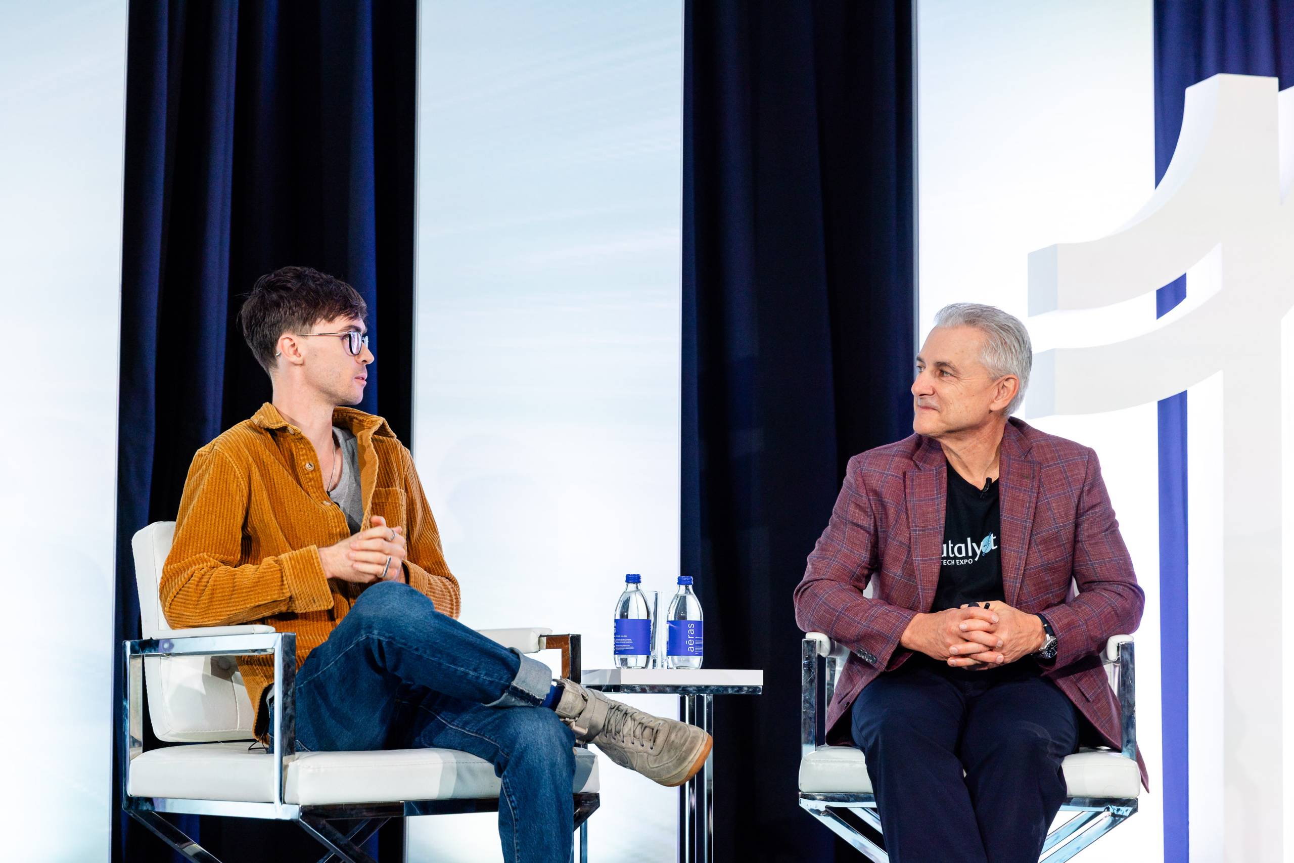 Cohere co-founder, Nick Frosst and Martin Wildberger, executive vice president of Innovation and Technology