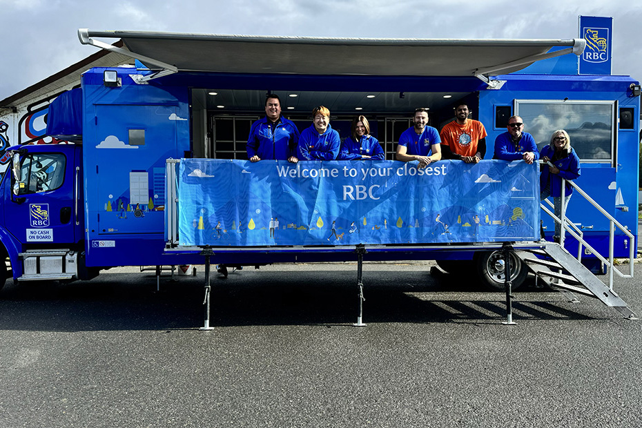 RBC team members greet community members at the mobile branch. 